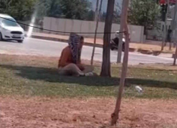 Kadın dilenci topladığı paraları sayarken cep telefonu kamerasına yakalandı