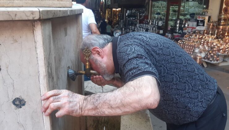 Sıcak havada çeşme başlarında serinlik