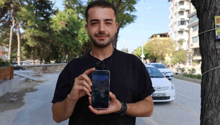Cadde ortasında kucağında keçiyle yürüyen yaşlı kadın tebessüm ettirdi