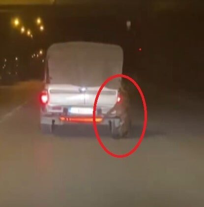 Aracın arkasına bağlı köpekle metrelerce yol gittiler