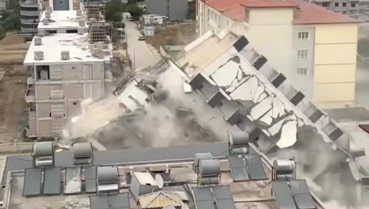 7 katlı bina iş makinesinin darbesiyle kağıt gibi yerle bir oldu