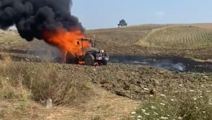 Yanan traktöre aldırmadı, çocuklarını teselli etti